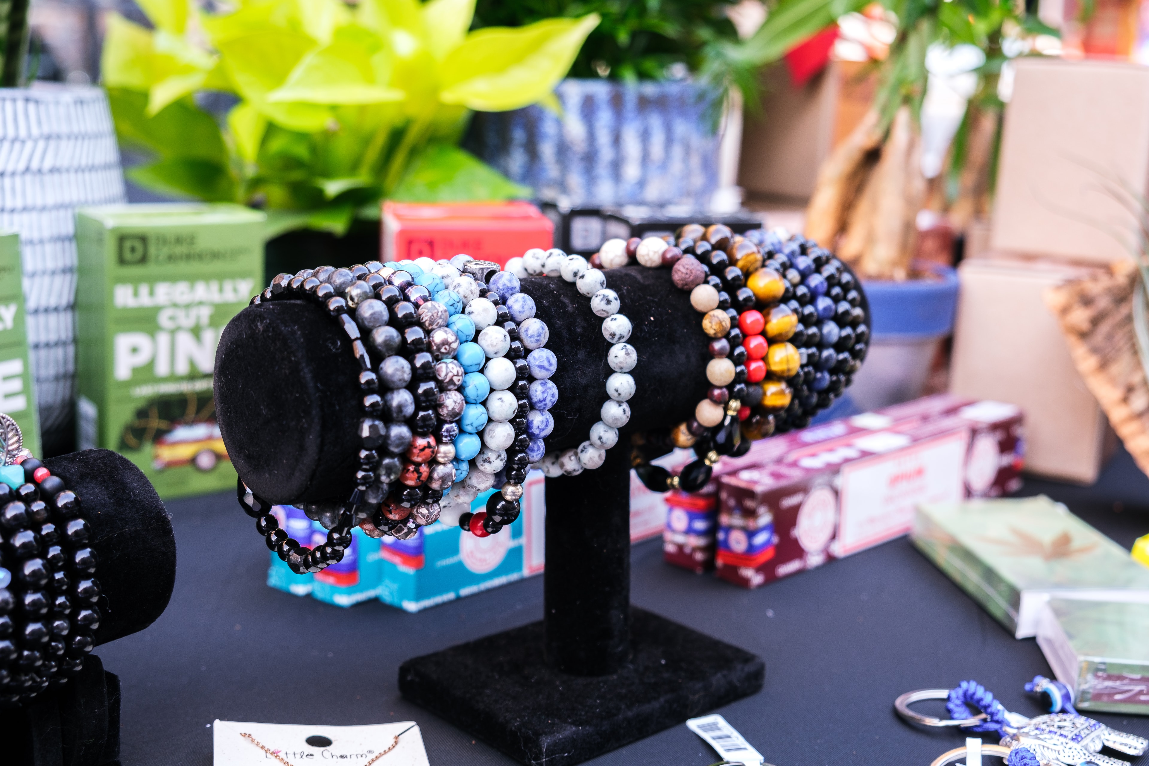 Handmade jewelry display at a market event